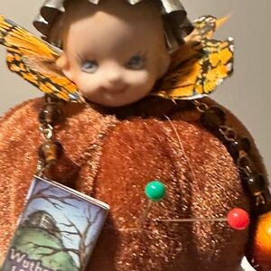 Handcrafted Brown Doll with Beaded Accents pin cushion.